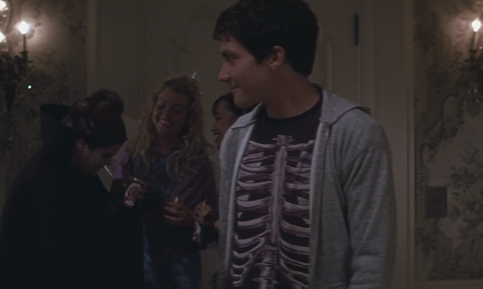 Donnie Darko, starring Jake Gyllenhaal, wearing his skeleton costume at a halloween party