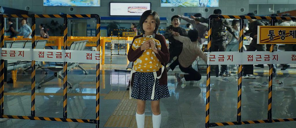 Su-an in Train To Busan. We watch the films through the eyes of the young girl.